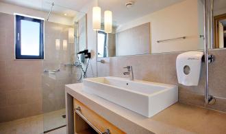 TML Plimmiri Family Room Type 2 Badezimmer