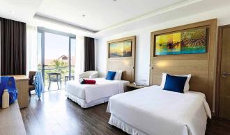 Nam Hoi An Deluxe Family Room Garden View Schlafen