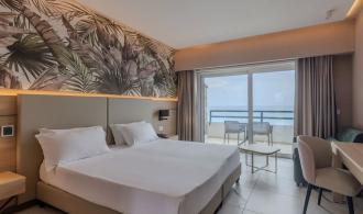 Rocca Nettuno Doppelzimmer Meerblick Schlafzimmer